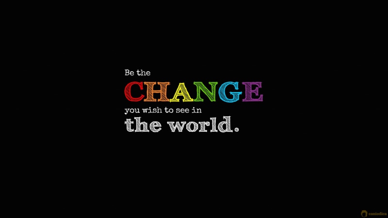 sign, black background, text, illuminated, glowing, multi colored, 1080P, close-up, dark, information, studio shot, western script, Mahatma Gandhi, message
