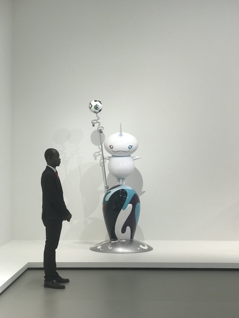 responsibility, men, wall - building feature, representation, silver colored, female likeness, table, copy space, sculptures, indoors, art and craft, museum attendant