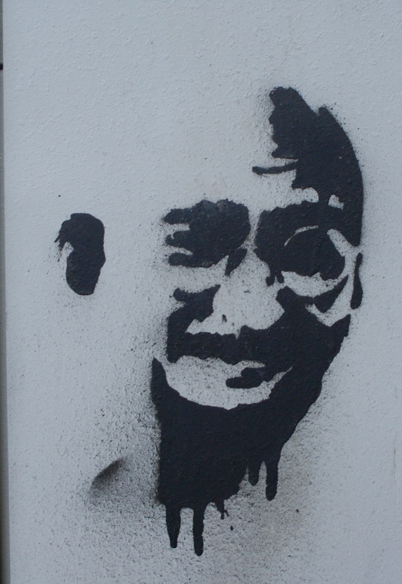 human representation, outdoors, wall, mural, sign, white color, art and craft, male, built structure, architecture, day, power box, spray, gandhi, representation