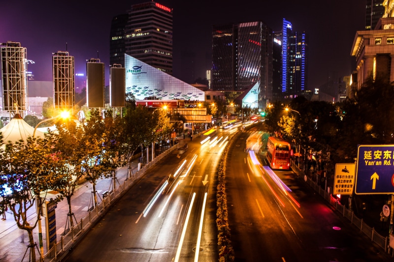 bus, road, traffic, cityscape, light trail, building, building exterior, busy, office building exterior, china, skyscraper, financial district, illuminated