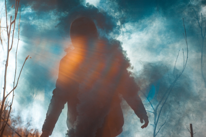 adult, nature, arts culture and entertainment, smoke, men, real people, standing, motion, fog, illuminated, stage, nightlife, haze, tree, three quarter length