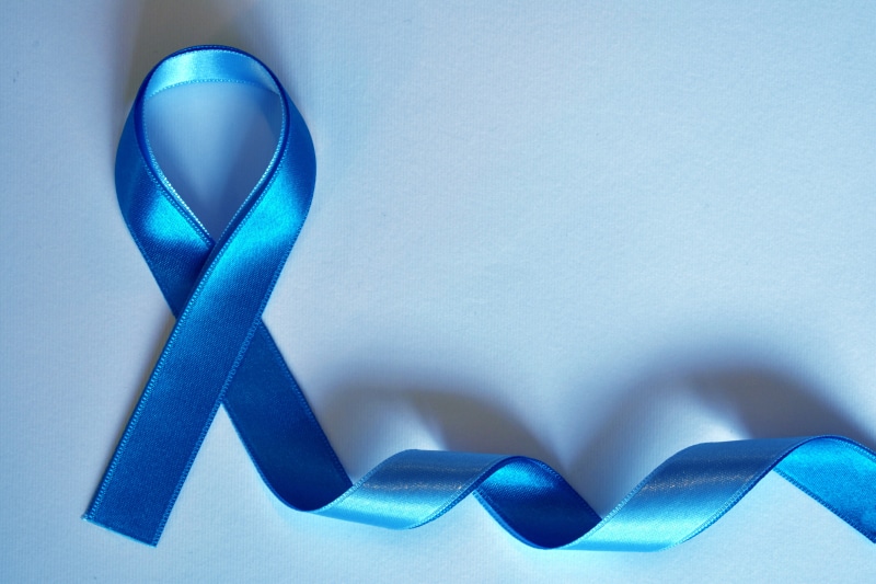 close-up, symbolic, blue, prostate cancer awareness, blue ribbon, single object, health, illness, blue background, abstract, art and craft, indoors, protection