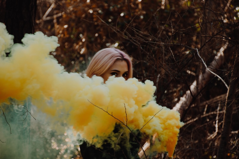front view, woman, selective focus, plant, releasing, nature, change, land, beautiful woman, lifestyles, headshot, leisure activity, hairstyle, real people