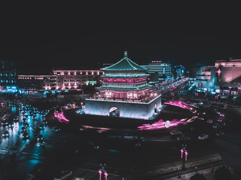 outdoors, cityscape, night, travel, nighttime, crowd, transport, rooftop, shaanxi, looking down, city, evening, pink hue, sky, building exterior, built structure