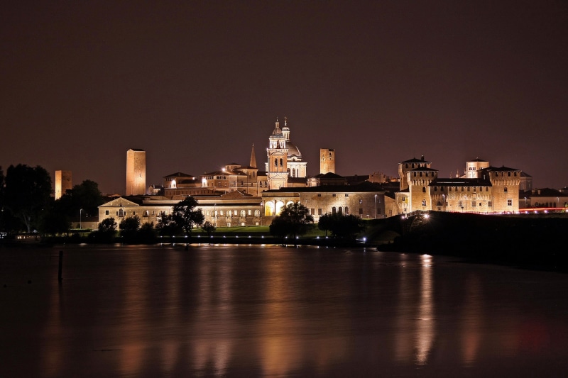 travel destinations, europe, nighttime, no people, bridge, lighting, city, tourism, mantova, building, water, architecture, illuminated, church, dusk, river