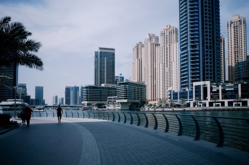 building exterior, water, look up, building, office building exterior, dubai marina, tree, dubai, sky, incidental people, united arab emirates, tower, architecture