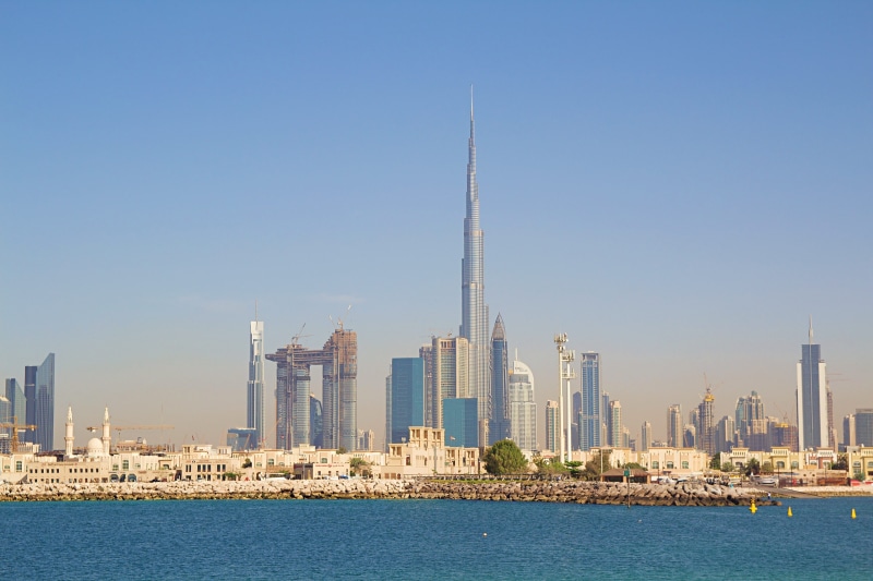 tall - high, dubai city, uae, dubai, modern high rise building, beach, skyscraper, landscape, waterfront, built structure, spire, travel destinations, heat