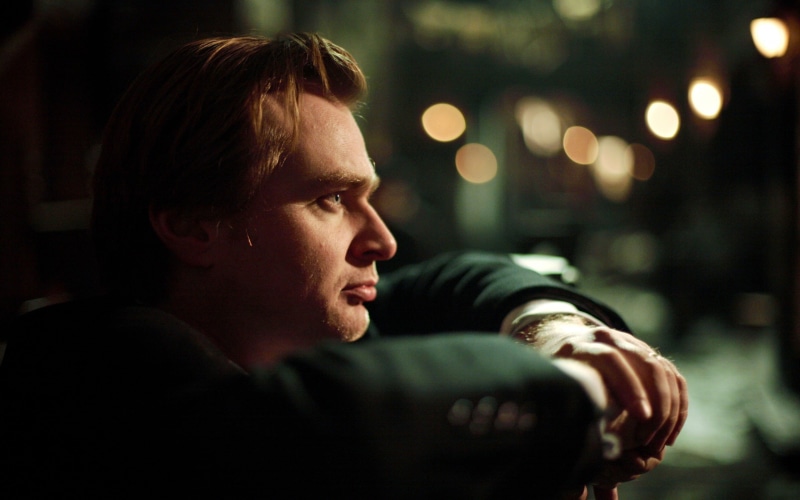 director, men, headshot, nolan, illuminated, one person, adult, 2K, focus on foreground, side view, christopher, human limb, brown hair, mid adult, close-up