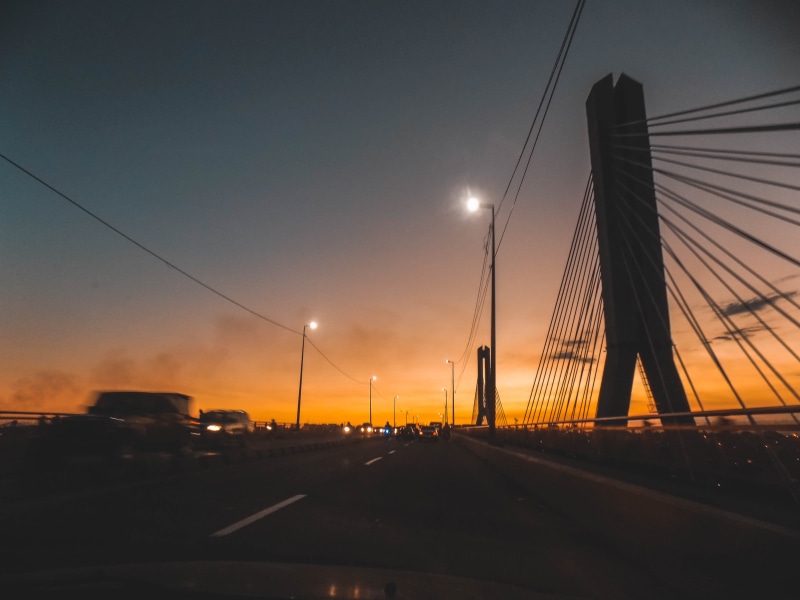 motor vehicle, orange color, fondo de pantalla, car, mode of transportation, electricity, outdoors, sunset, apuesta de sol, bridge, anochecer, bridge - man made structure