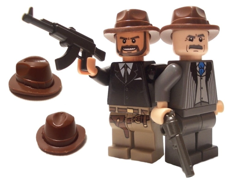 social issues, aggression, still life, representation, LEGO, two objects, armed forces, indoors, toys, military, studio shot, tripod, toy, gun, government