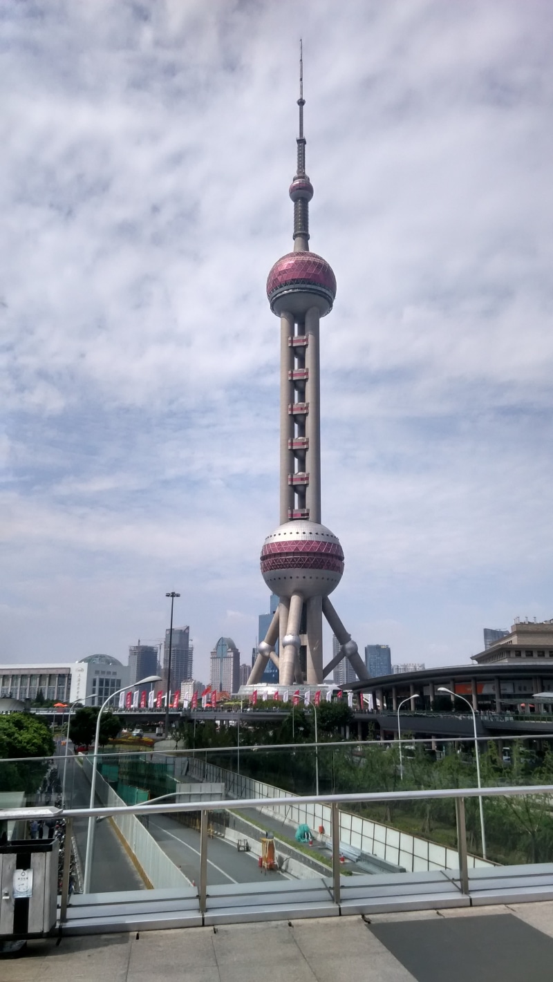 china, travel destinations, building exterior, day, cloud - sky, tall - high, cityscape, architecture, city, skyscraper, no people, road, shanghai, spire
