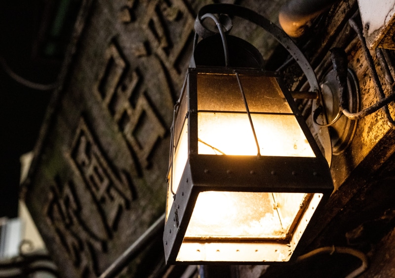 night, headlight, architecture, window, tire, light fixture, city, metal, mandolin, lantern, lampshade, lighting equipment, lamp post, outdoors, building