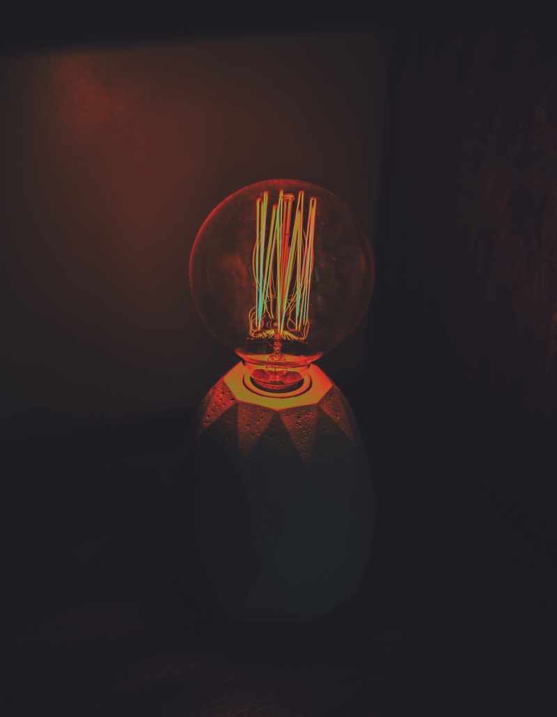 musical instrument, glass - material, reflection, close-up, single object, transparent, lightbulb, light - natural phenomenon, fire, neon, laser, flare