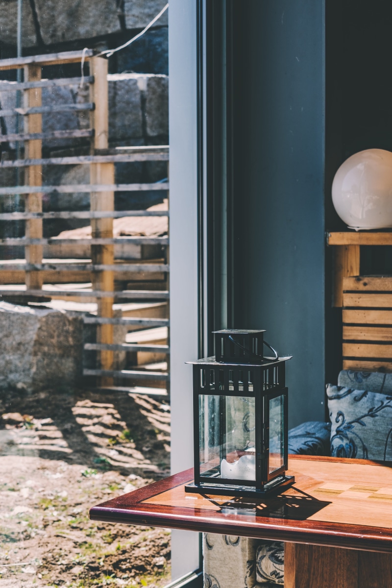 city, interior design, clothing, fashion, building exterior, metal, coffee table, no people, candle, evening dress, lamp, framed, communication, built structure