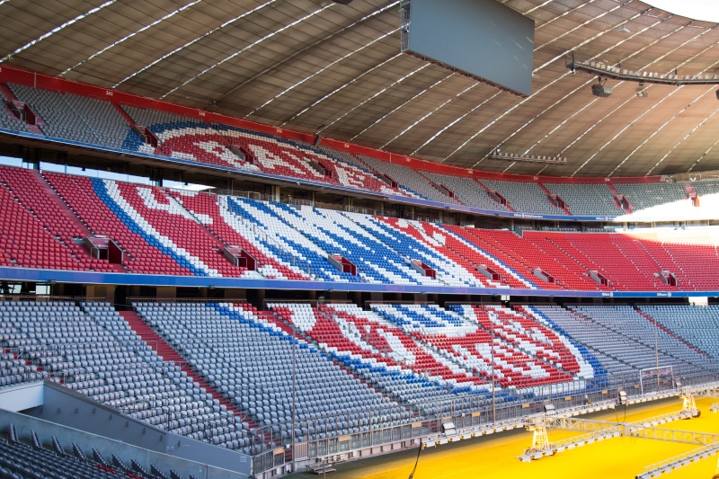 stadium, citrus fruit, sport, grapefruit, daytime, blue, decoration, pattern, assembly line, multi colored, paint container, shaker, red, produce, building exterior