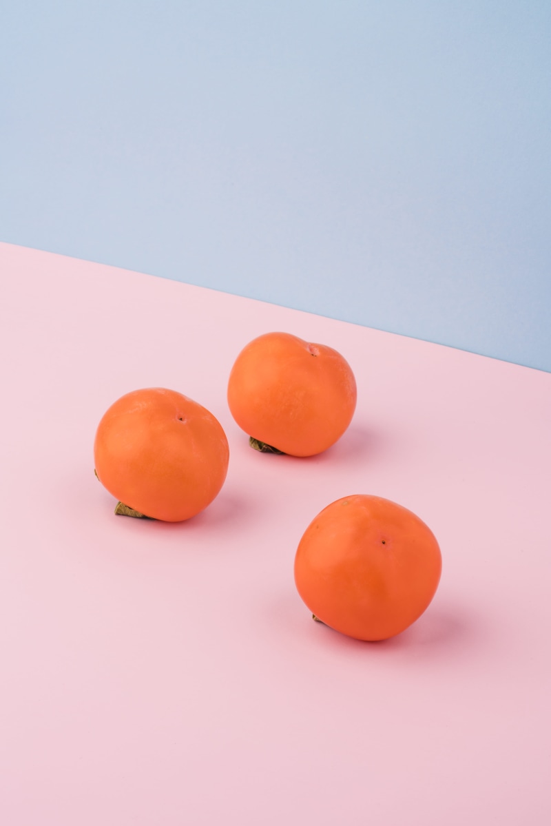 fluffy, funny, indoors, tomatoe, food and drink, colored background, freshness, blue background, raw food, fruit, surface, red, fruits, wellbeing, pink and blue