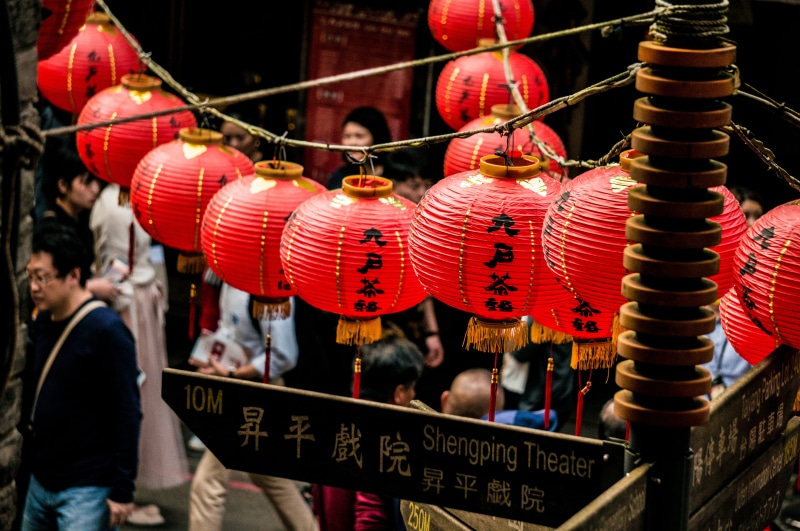 clothing, shop, chinese new year, paper, celebration, festival, decoration, corset, red, pants, outdoors, inflatable, 4K, human, lighting equipment, apparel