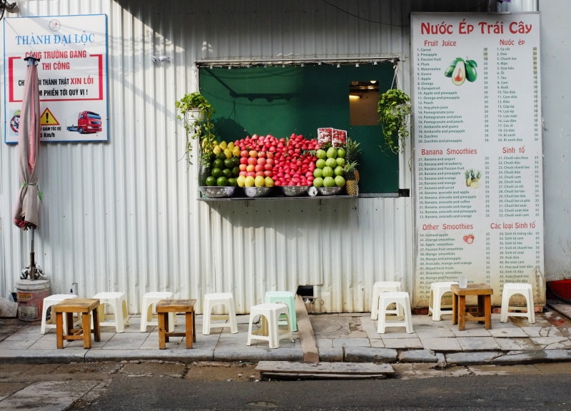 no people, food and drink, information, kiosk, spoke, vase, building exterior, food, flower, 2K, citrus fruit, bazaar, outdoors, machine, plant, western script