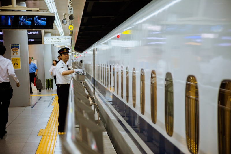 near, men, transport, occupation, healthcare and medicine, transportation, control, full length, safety, passenger train, security, railing, fast, tokyo