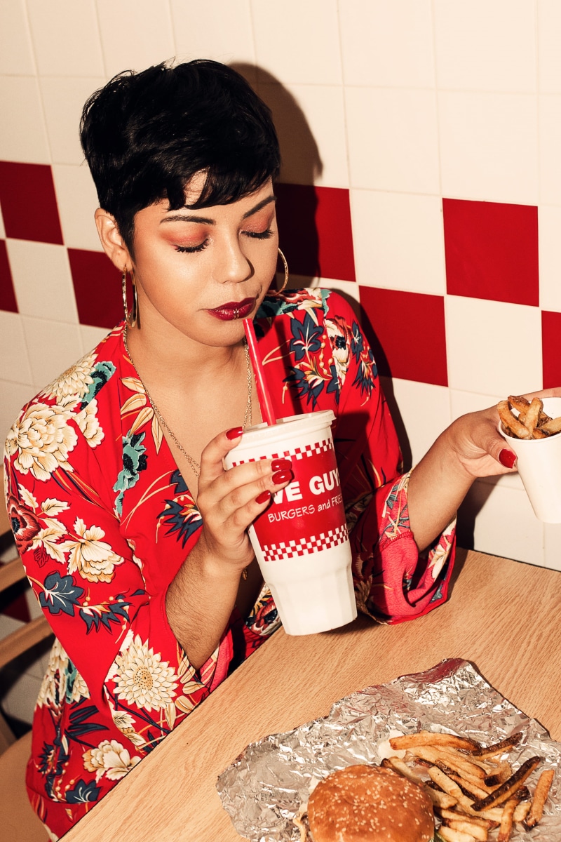 preparing food, meal, restaurant, hair, real people, freshness, hairstyle, eating, finger, woman, sitting, clothing, cafeteria, drinking, women, young women
