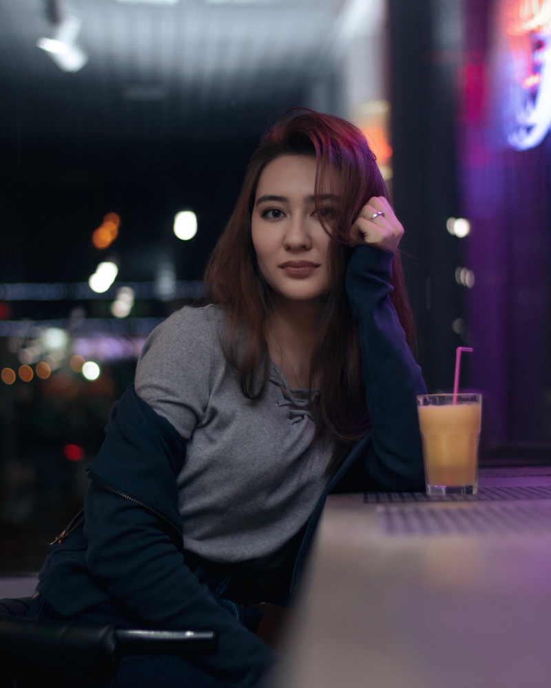 hairstyle, waist up, petrov st 18/2, one person, drink, human, young adult, leisure activity, real people, juice, sitting, night, beautiful woman, woman