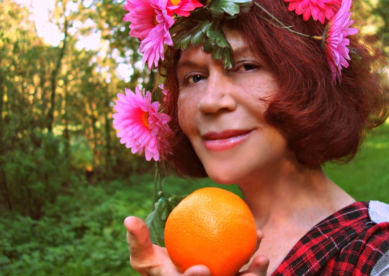 one person, fruit, freshness, focus on foreground, garland, outdoors, nature, flower power, hippie, 1080P, happiness, retro, front view, plant, looking at camera
