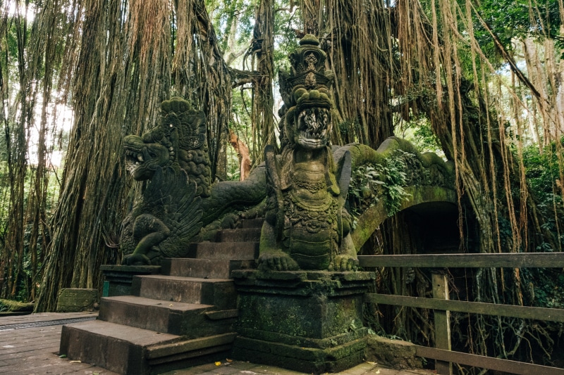 no people, archaeology, representation, forest, growth, indonesia, plant, sacred, trees, shrine, belief, male likeness, day, human representation, outdoors