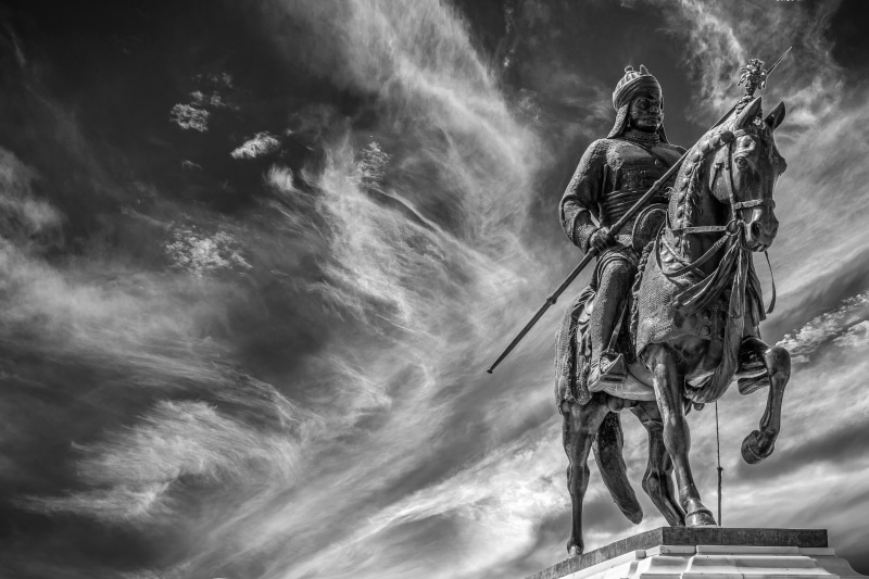 low angle view, landmark, craft, 5K, destination, travel, human representation, grayscaled, photo, rope, statue, people, city, historic, culture, riding