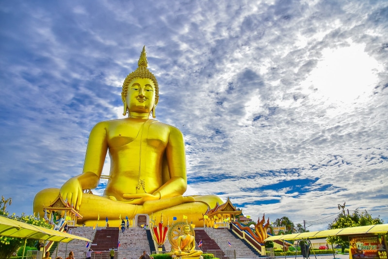 low angle view, buddha, place of worship, statue, wat muang, spirituality, architecture, art and craft, status, sky, ang thong, cloud - sky, male likeness