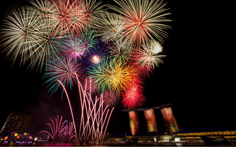 building exterior, new, 4K, long exposure, sands, fireworks, light, bay, low angle view, built structure, firework, sparks, hotel, night, new years eve