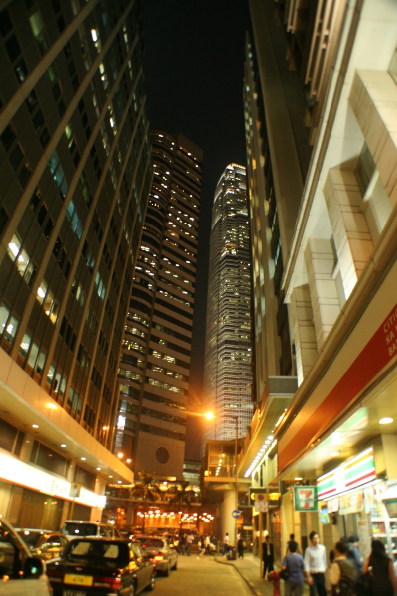 china, building exterior, hongkong, night, group of people, car, illuminated, architecture, built structure, outdoors, incidental people, traffic, modern