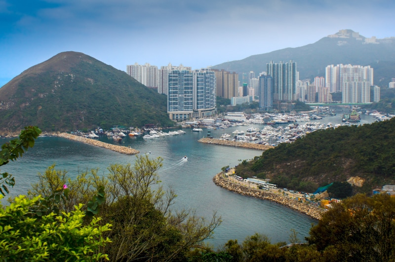 park, china, water, outdoors, near, office building exterior, plant, rise, day, architecture, city, mountain range, bay, transportation, hong kong ocean park