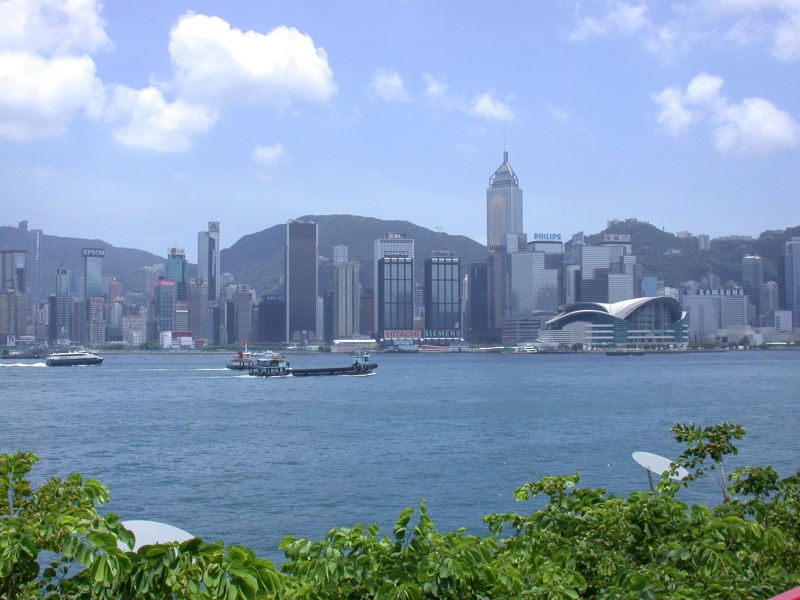 outdoors, cityscape, metropolis, built structure, view, travel, passenger craft, transportation, nautical vessel, travel destinations, cloud - sky, hong kong