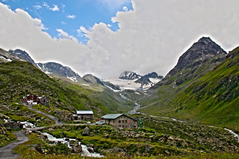 alpine, glacier, landscape, ferner, cloud - sky, outdoors, mountains, tranquility, jamtal, mountain, summer, beauty in nature, mountain range, land, building