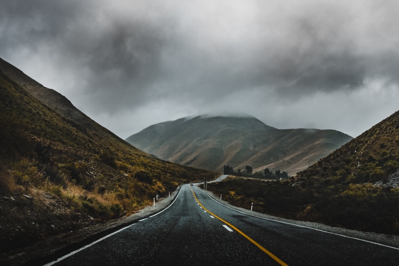 sky, cloud - sky, road marking, new zealand, hill, mountain range, photo, environment, vanishing point, cloud, haze, beauty in nature, canterbury, rainy