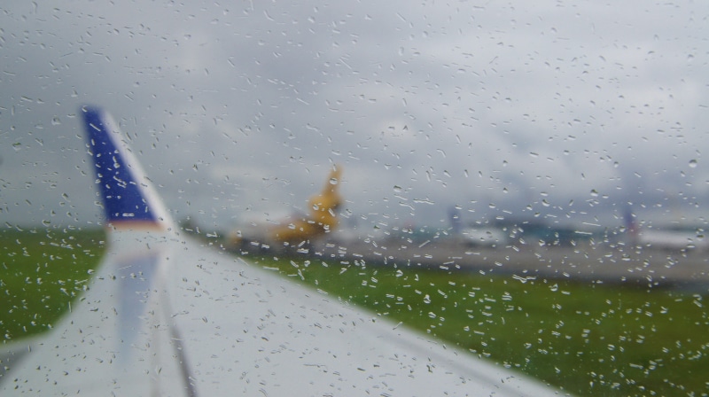 rainy season, vehicle interior, airport, wet, indoors, raindrop, drop, day, glass, panama city, transportation, sky, water, mode of transportation, transparent