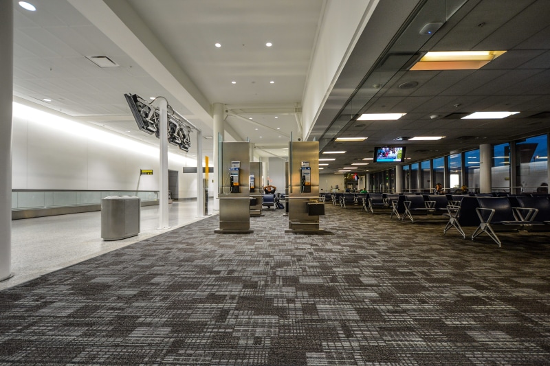 lighting equipment, tourism, Phones, layover, full length, airport, tiled floor, ceiling, adults only, corridor, built structure, flooring, 4K, no people