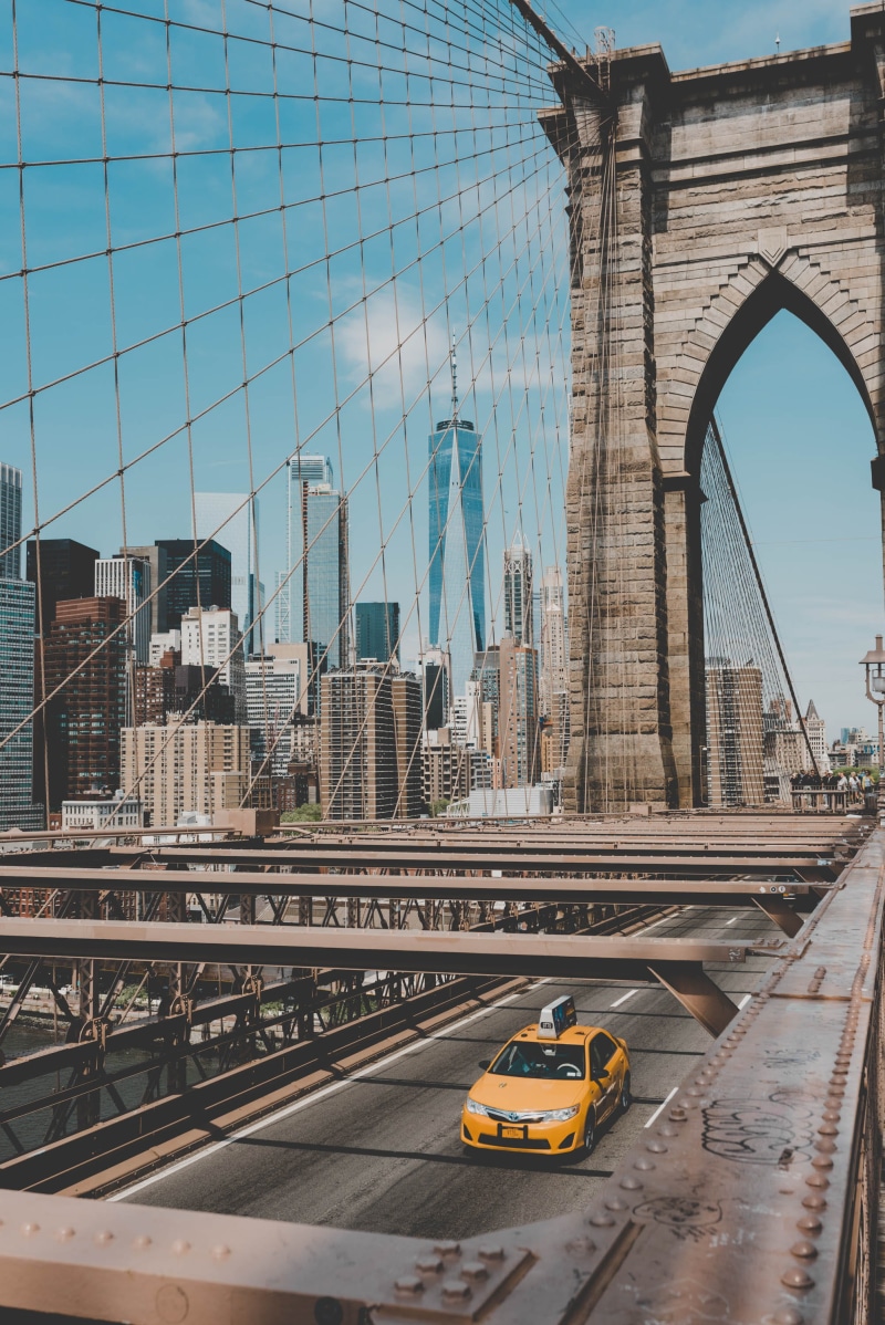 suspension bridge, taxi, motor vehicle, 2K, angle, center, cross, nyc, office building exterior, building, bridge, trade, road, sky, land vehicle, architecture