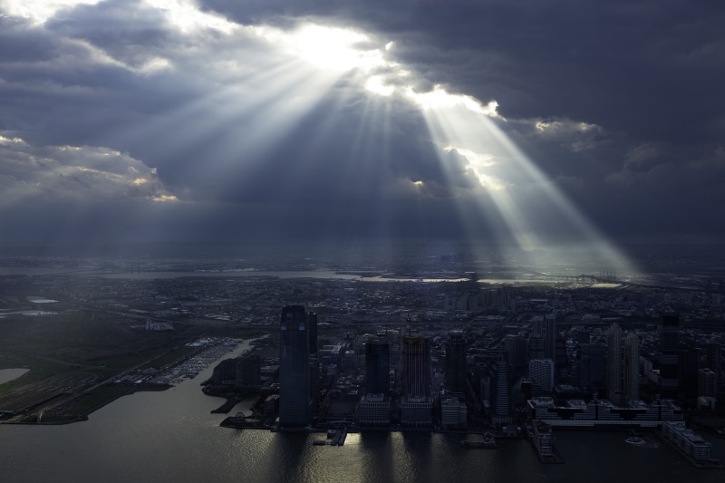 building exterior, skyscraper, aerial view, united states, cityscape, sun, cloud, transportation, one world trade center, lens flare, sky, nature, sunlight