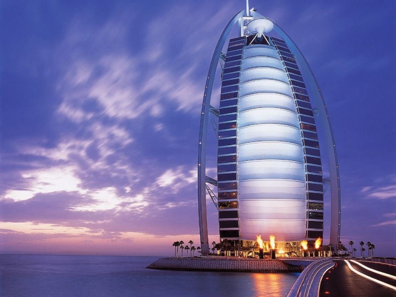 architecture, illuminated, dusk, sea, modern, Burj Al Arab, skyscraper, building exterior, travel, cloud - sky, nature, outdoors, no people, romantic sky
