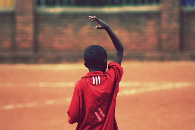 day, africa, red shirt, clothing, right, adida, young adult, rwanda, leisure activity, child, human arm, men, shirt, soccer, boys, head, retrato de espalda