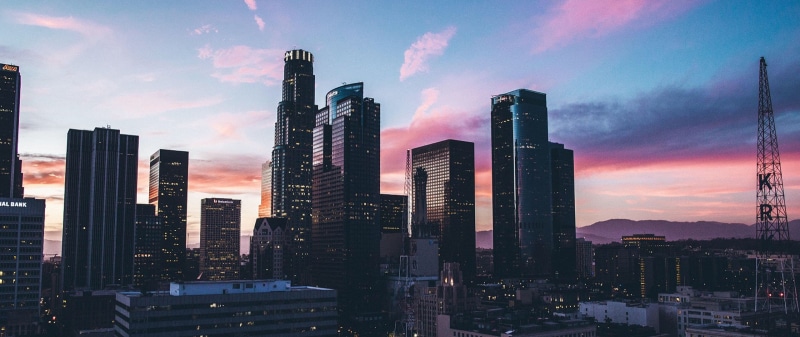 residential district, landscape, outdoors, built structure, travel destinations, tall - high, sky, sunset, romantic sky, nature, building exterior, building