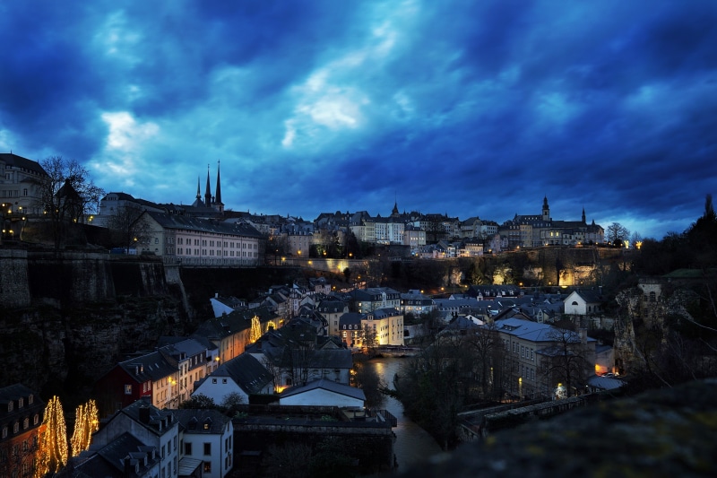 town, blue hour, village, travel, architecture, illuminated, lights, sky, clouds, residential district, casemates, blue, nature, night, waters, travel destinations