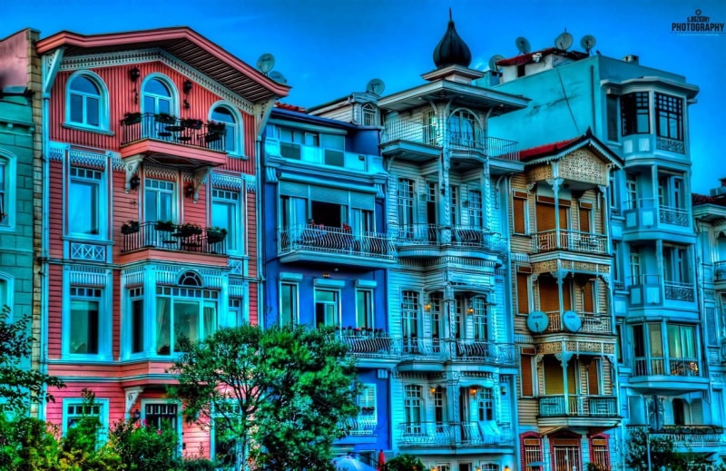 apartment, building, architecture, city, residential district, sky, tree, no people, travel destinations, clear sky, the past, outdoors, low angle view
