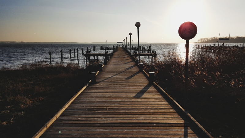 dock, the way forward, sea, railing, outdoors, water, beach, sunrise, nature, wood - material, built structure, tranquility, scenics - nature, landscape