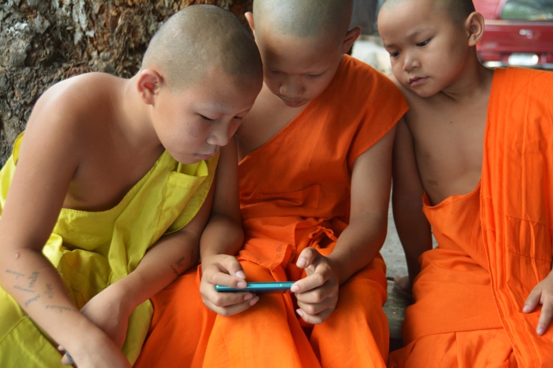 kid, people, males, religious, thailand, group of people, travel, culture, novices, girls, little, phone, monks, men, boys, sitting, females, togetherness