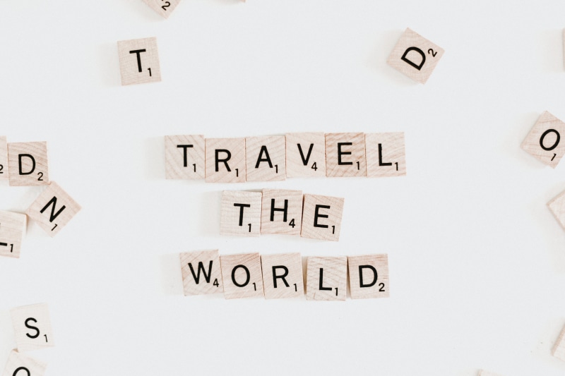 western script, alphabet, table, travelling, capital letter, letter, exclamation point, torn, letters, sign, words, globe, safety, wall - building feature
