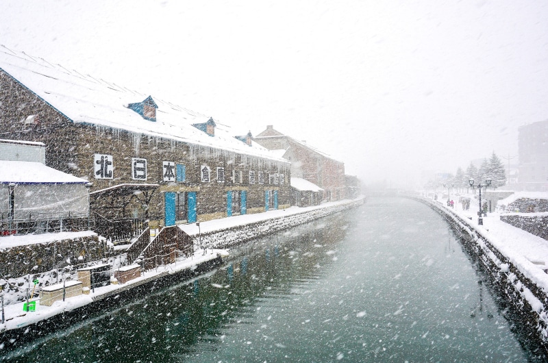 body, built structure, snowing, no people, mode of transportation, sky, transportation, snowcapped mountain, day, cold temperature, street, hokkaido, otaru travel