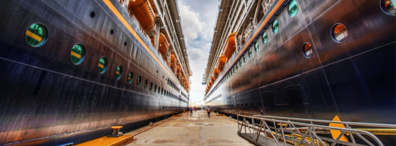 incidental people, Harbor, built structure, vanishing point, wall - building feature, Cruise, black, Disney, two, public transportation, Ships, diminishing perspective
