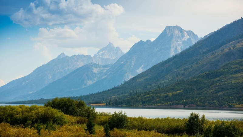 tranquility, grand tetons over jackson lake, tranquil scene, no people, environment, nature, mountain, water, scenics - nature, non-urban scene, range